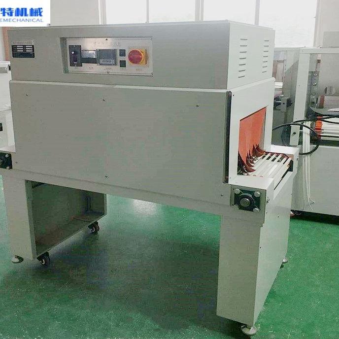 厂家热收缩膜包装机热收缩彩盒餐具产品外包装膜塑封封切热收缩机