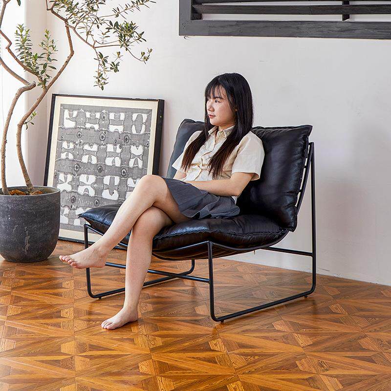 北欧设计师休闲椅单人西皮民宿小户型卧室阳台铁艺单人沙发椅