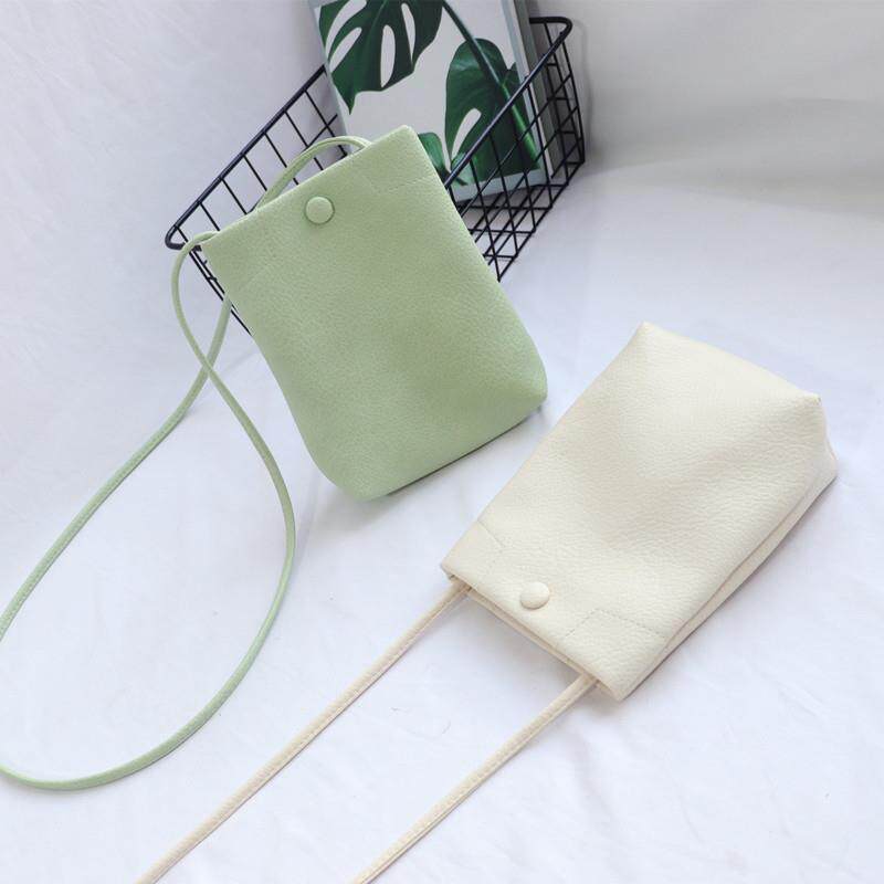 手机包女新款夏轻便斜挎包简约小水桶包迷你小包包纯色手机袋