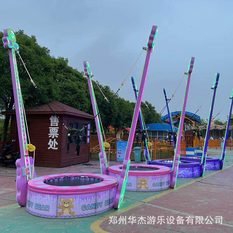 新款网红椰树摆摊蹦蹦床儿童电动手动发光长颈鹿蹦极商场游乐设备