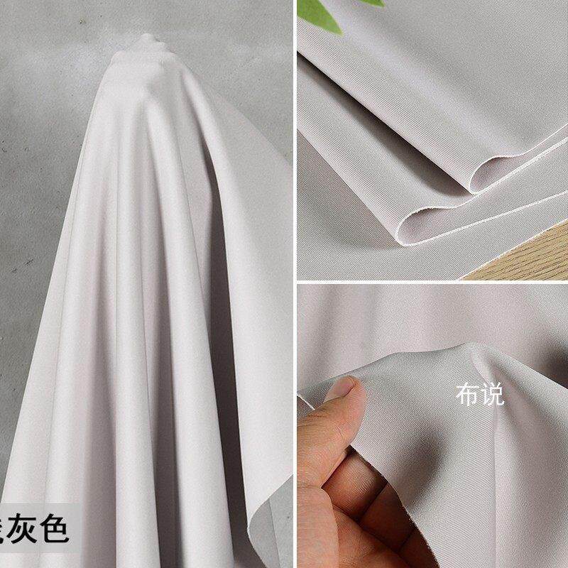 浅灰色冰丝空气层面料 有弹力薄太空棉清爽夏礼服服装设计diy布料