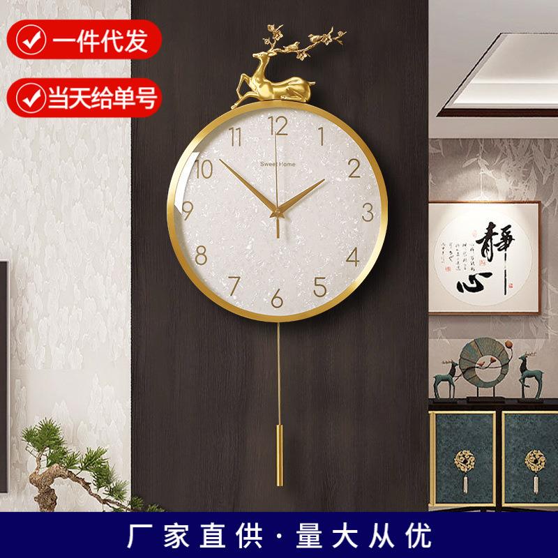 现代轻奢挂钟创意表挂墙家用客厅静音时尚玄关壁钟简约时尚石英钟