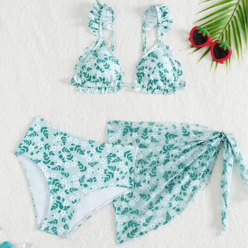 Split style children's swimsuit with three floral tie up