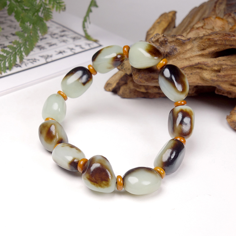 收藏级新疆和田玉黑皮籽料原石肉质细腻油润石来运转手串46.69克