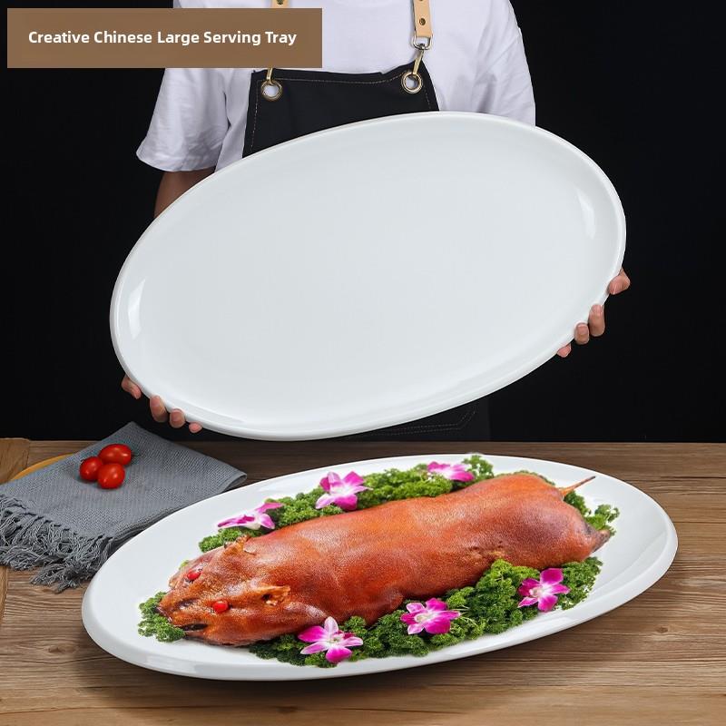 纯白陶瓷1.0米特大蒸鱼盘可与深盘西餐厅椭圆形烤全羊乳猪龙虾盘