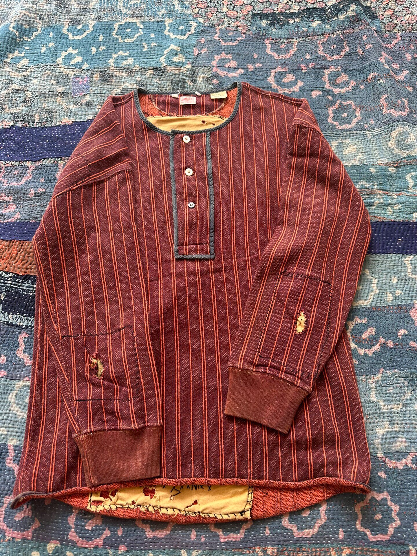 Levi’s Long-Sleeve Red Stripe Top — label