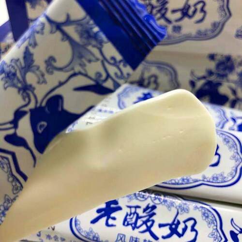 光头仔老酸奶风味软糖拉丝奶条老式奶糖糖果盒装8090儿时怀旧零食