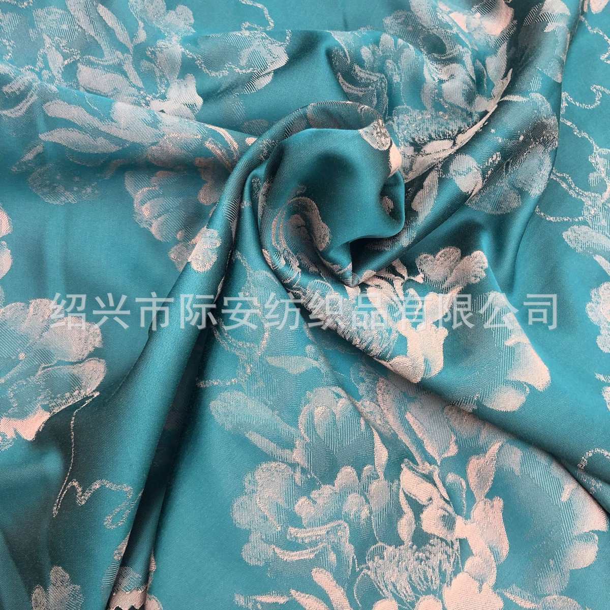 太阳花微弹提花面料人棉弹力汉服布料旗袍面料吊带连衣裙服装时装