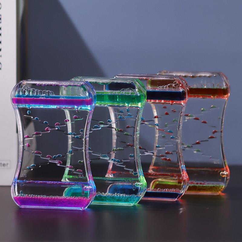 。滑梯礼物液体双色沙漏计时器水晶水滴流动双色油滴流沙摆件油漏