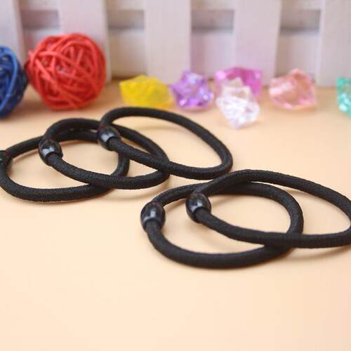 New black beaded hair tie with 0.3cm cord diameter, high ela