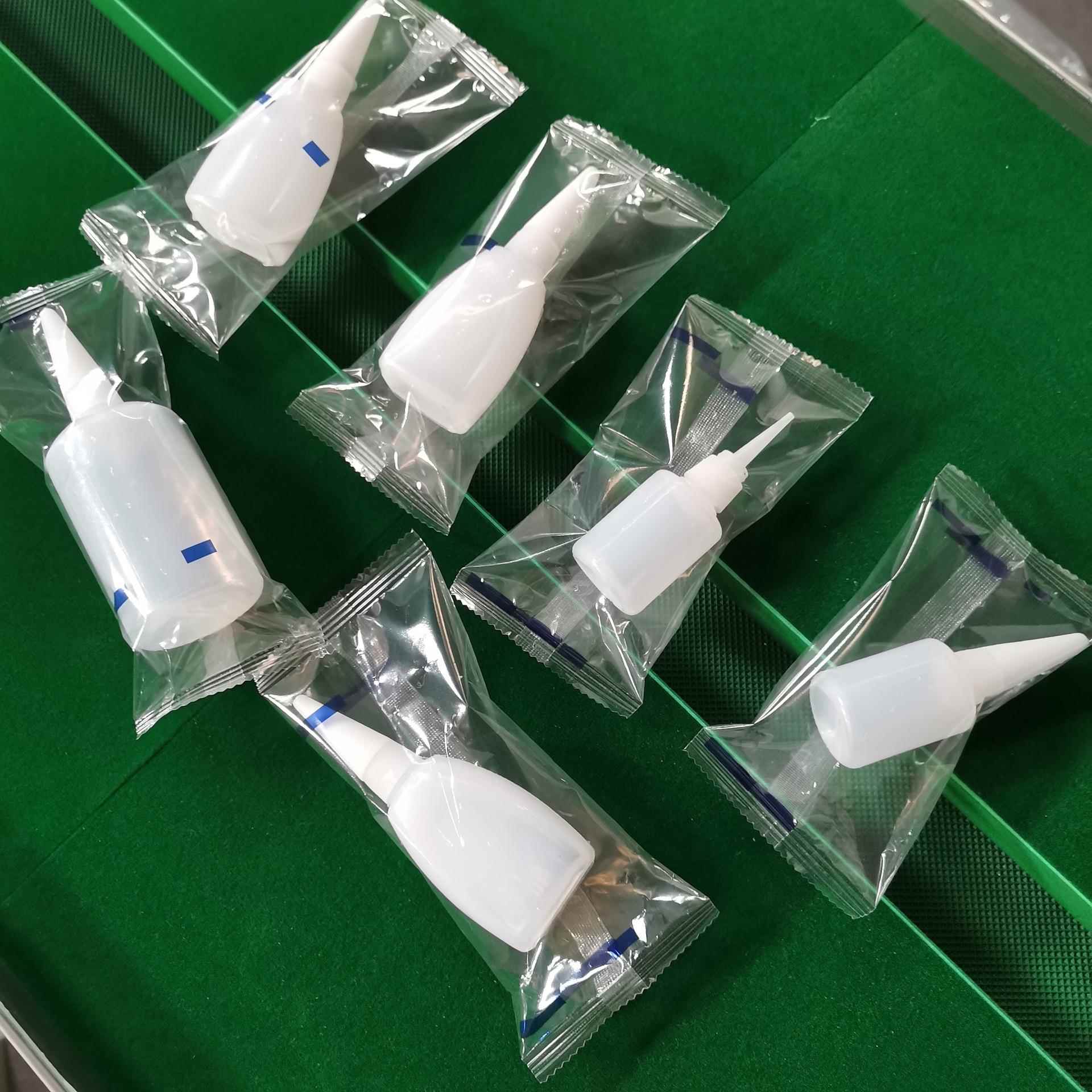 52胶水博伽瓶子包装机 油瓶独立袋打包机 博伽3套500三伺服包空装