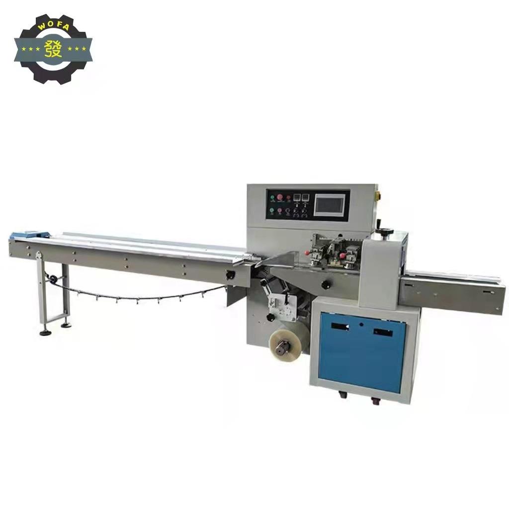 山东机械上走纸枕式包装机蔬菜包装机胶带包装机