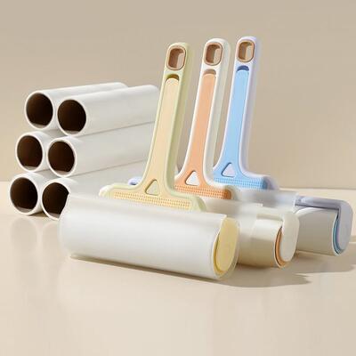 Lint roller with tear-off adhesive sheets, felt brush for re