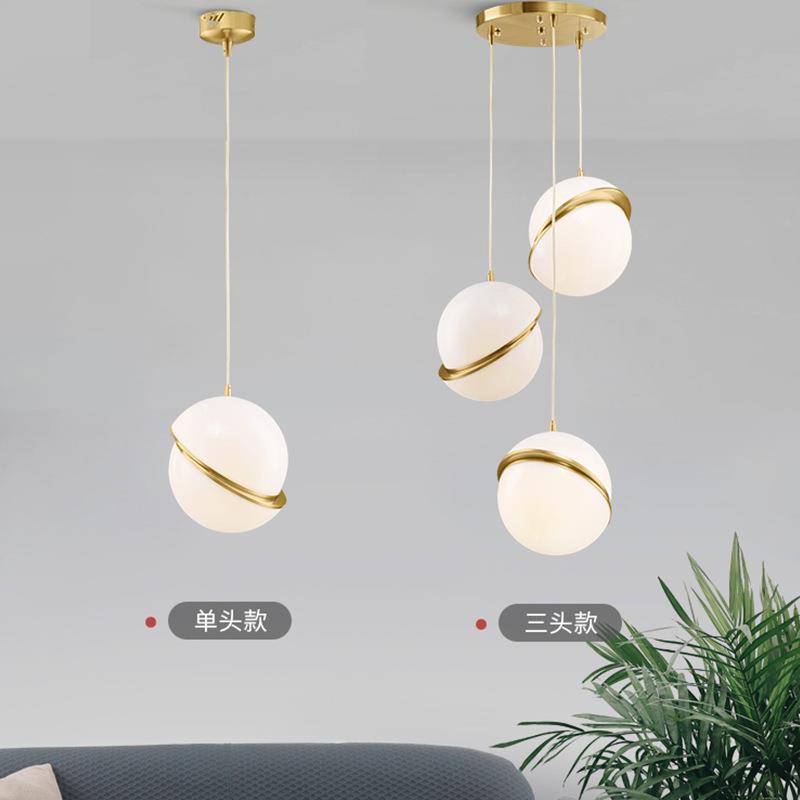 北欧餐厅饭led创意单头床头服装店咖啡厅装饰个性现代错位球吊灯