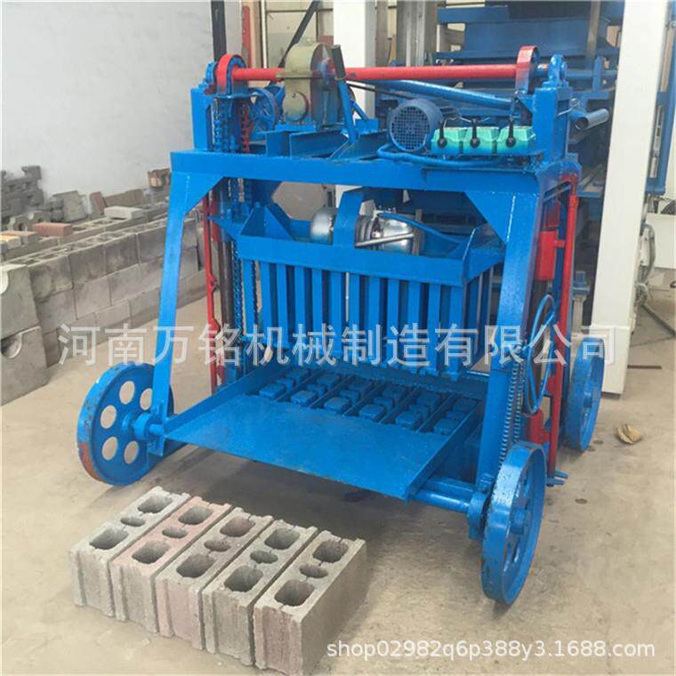 卢旺达免托板行走式空心砌块机下蛋砖机粉煤灰水泥制砖机生产设备