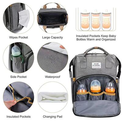 Foldable bed diaper bag with changing station insulated pock