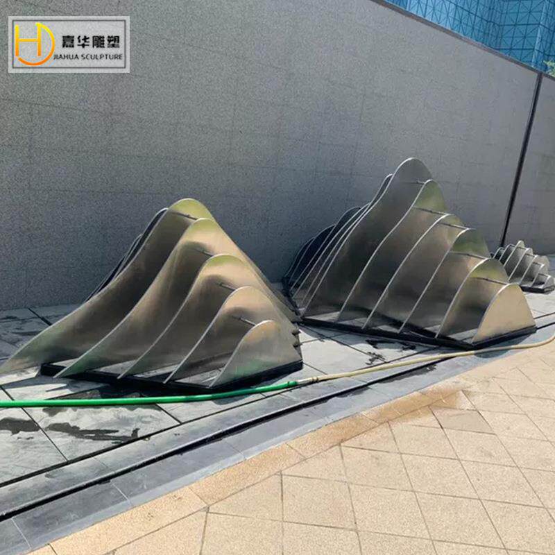 不锈钢假山雕塑金属切面镂空抽象山形线条假山户外房地产小区摆件图片