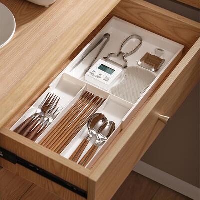 Expandable drawer organizer for kitchen cutlery and utensils