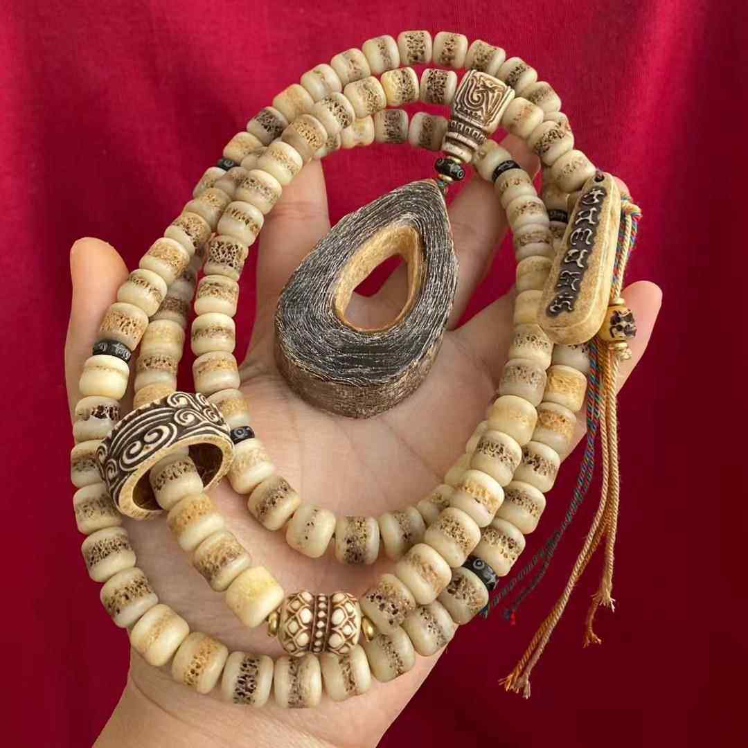 藏式牛骨嘎嘎108颗套装男女通用驼骨回流开片炸纹老形