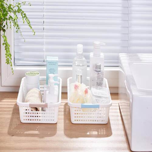 Rectangular plastic storage basket for organizing miscellane