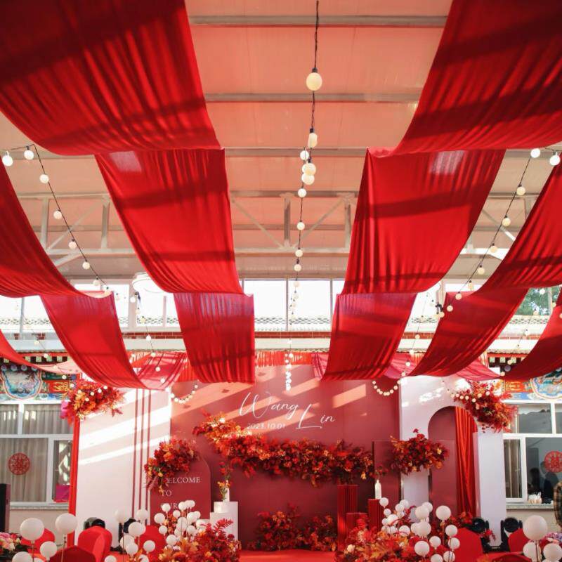 五一氛围感吊顶装饰大红布丝绸波浪吊顶布幔汽车4s店展厅装饰彩带