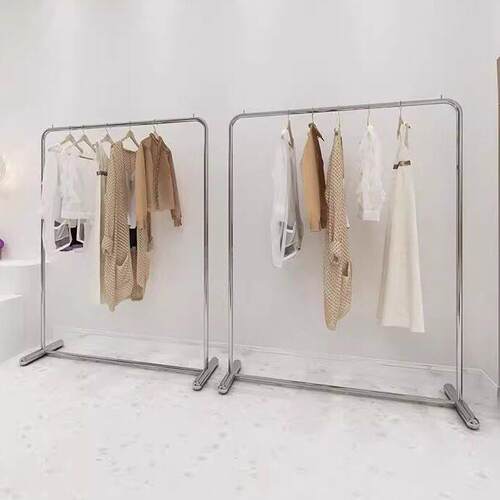 服装店服装展示架明亮不锈钢衣架女孩服装落地式岛式货架流行服装
