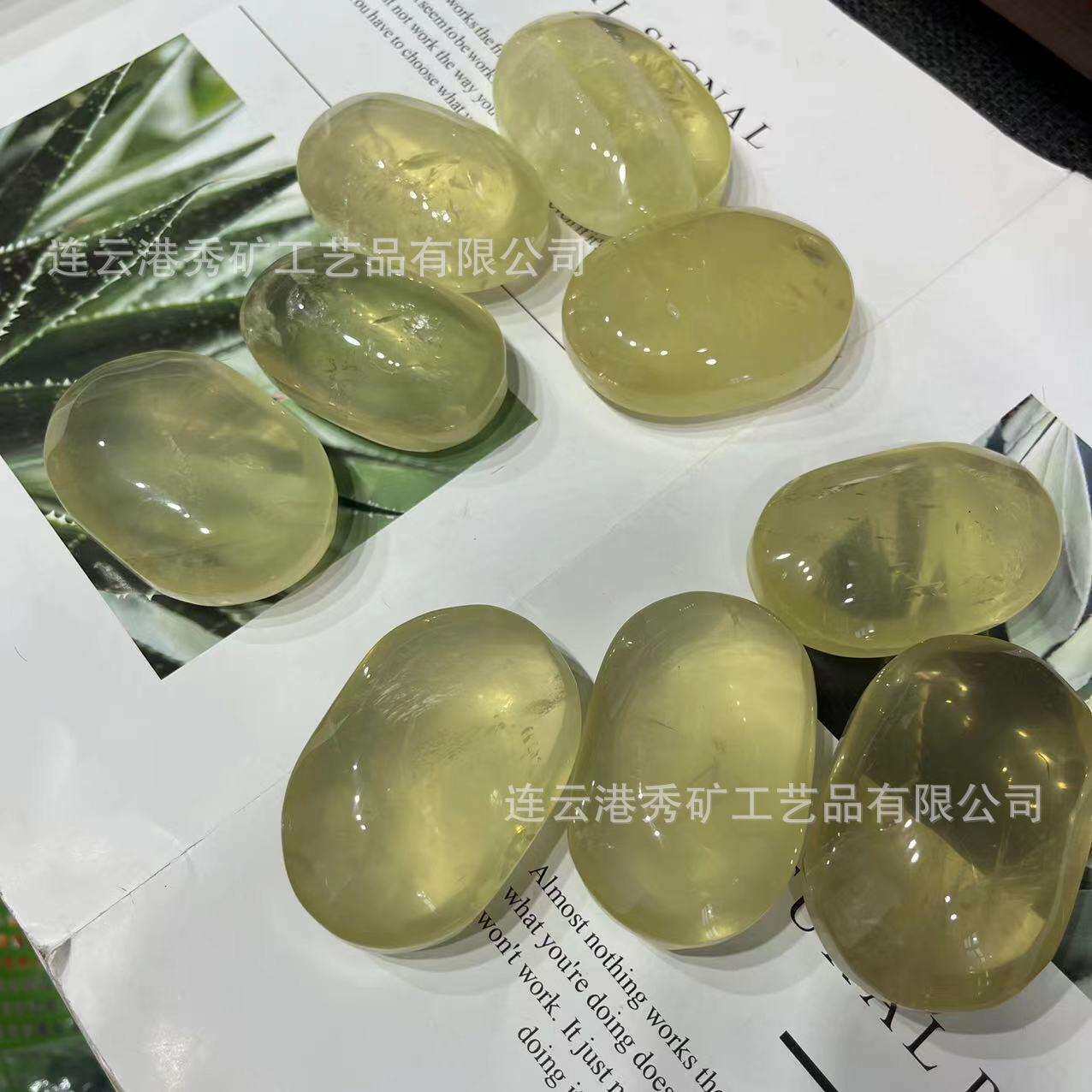 厂家天然黄水晶把玩水晶原石打磨手把件居家办公摆件