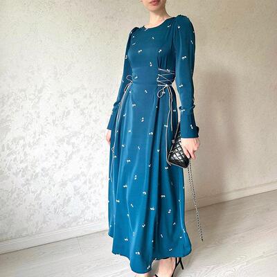Women's long skirt with a waist cinching design