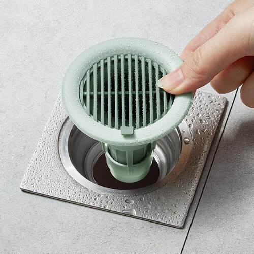 Wave-patterned anti-odor drain core for bathroom floor drain