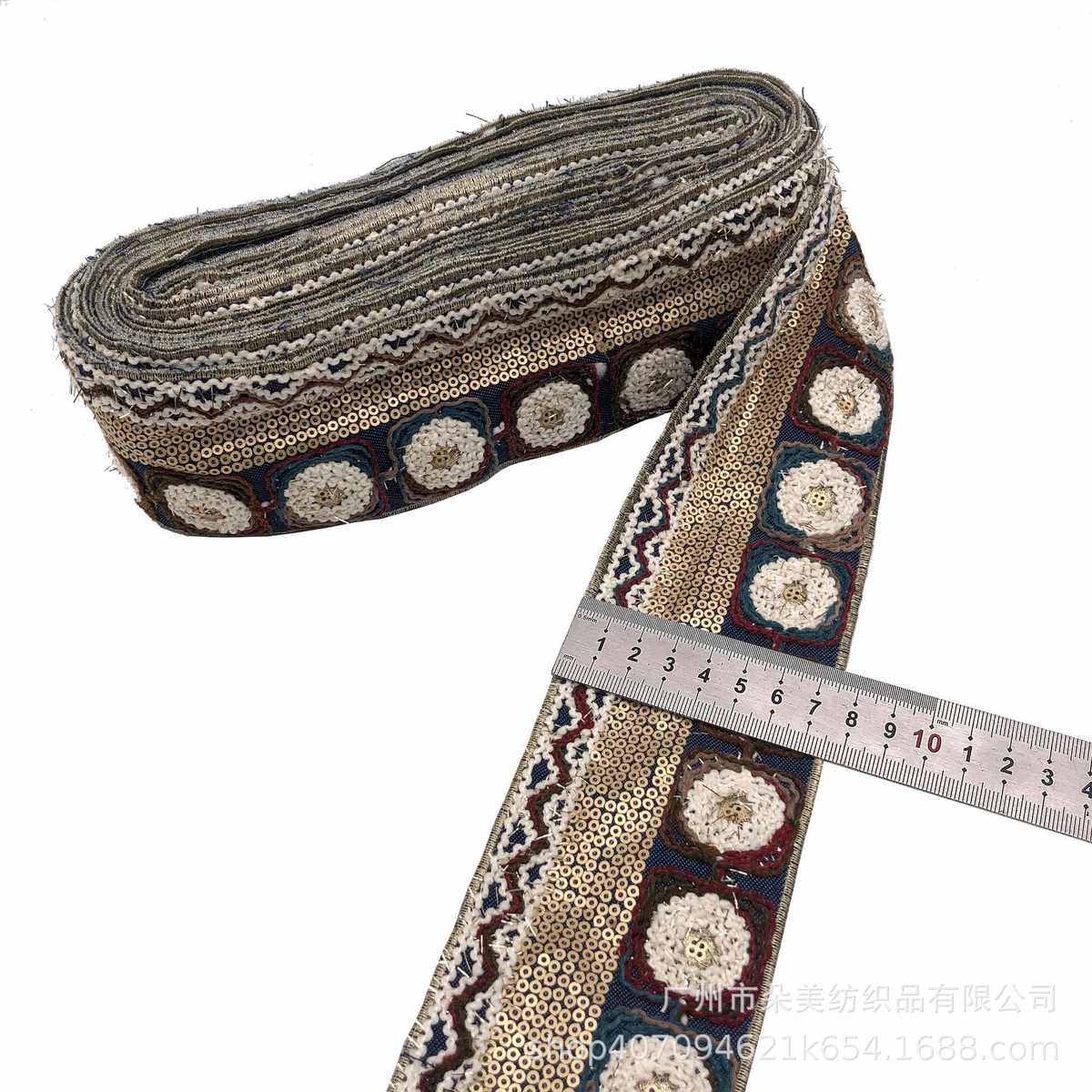 厂家批发 牛仔布底刺绣花边 民族风股线珠片绣花条码 鞋材配料