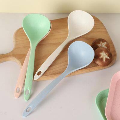 Large plastic soup spoon with a long handle, made from wheat