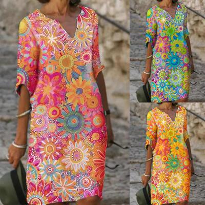 Colorful printed dress with V-neck and mid sleeves,