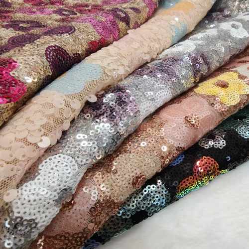 2025年新款全涤500米克时尚亮片绣面料时装服饰背景布常用纺织品