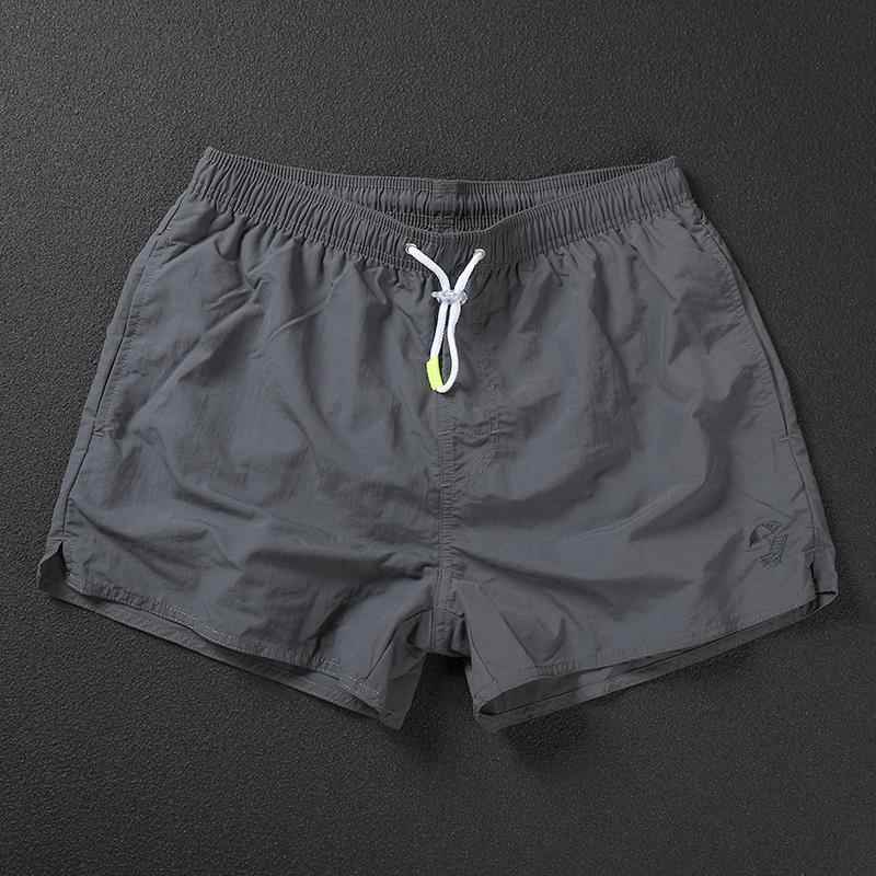 代购三分短裤男灰色宽松速干运动健身跑步居家裤休闲短款沙滩裤男