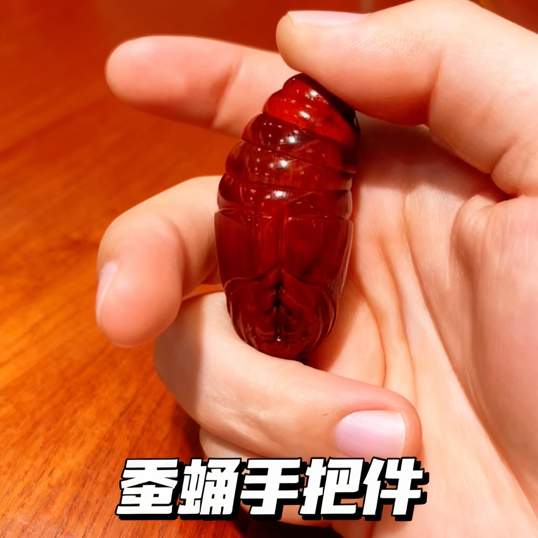 手把件蚕蛹尾部旋转小随身木制东西南北可动旋转按摩无漆手盘件图片