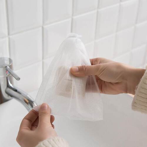 Japanese-style handcrafted soap foaming net with a loop for