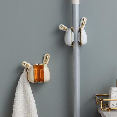 A luxury bathroom no-drill white rabbit wall-mounted mop hol