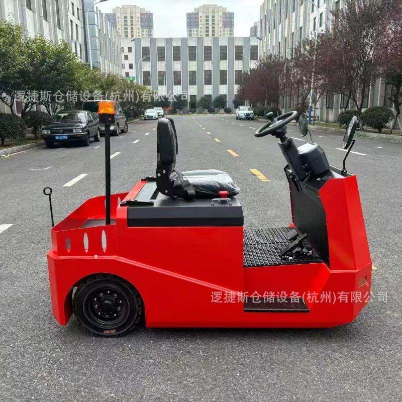 厂区牵引车头物流车间四轮平板物料搬运挂车座驾式电动牵引车