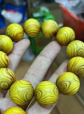 琥珀木手串鬼脸对眼明子佛珠颗红黄油透光精工小孔