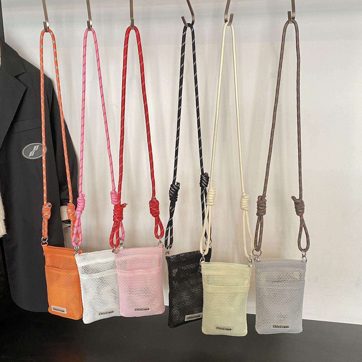 小巧轻便斜挎手机袋女韩版夏日小众设计拉链手机包网格镂空单肩包