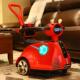 高档儿童小电动车可坐人红瓦力具车网旋转宝宝玩手推遥车孩飘逸转