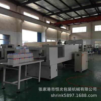 每分钟10-15包直线式膜包机速度快更换瓶型简单的热收缩膜包装机