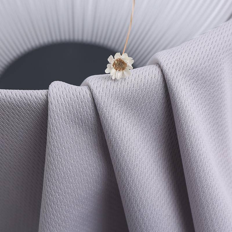 新款直销全涤75D/36F针织鸟眼布面料 米通布球服校服体恤快干提花
