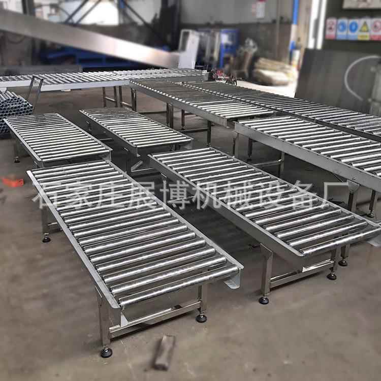 厂家快递包装装配线 物流输送转弯动力滚筒线 托辊卸货滑梯流水线