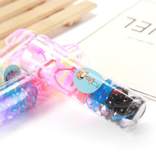 Small tube disposable elastic hair ties, black and colorful,