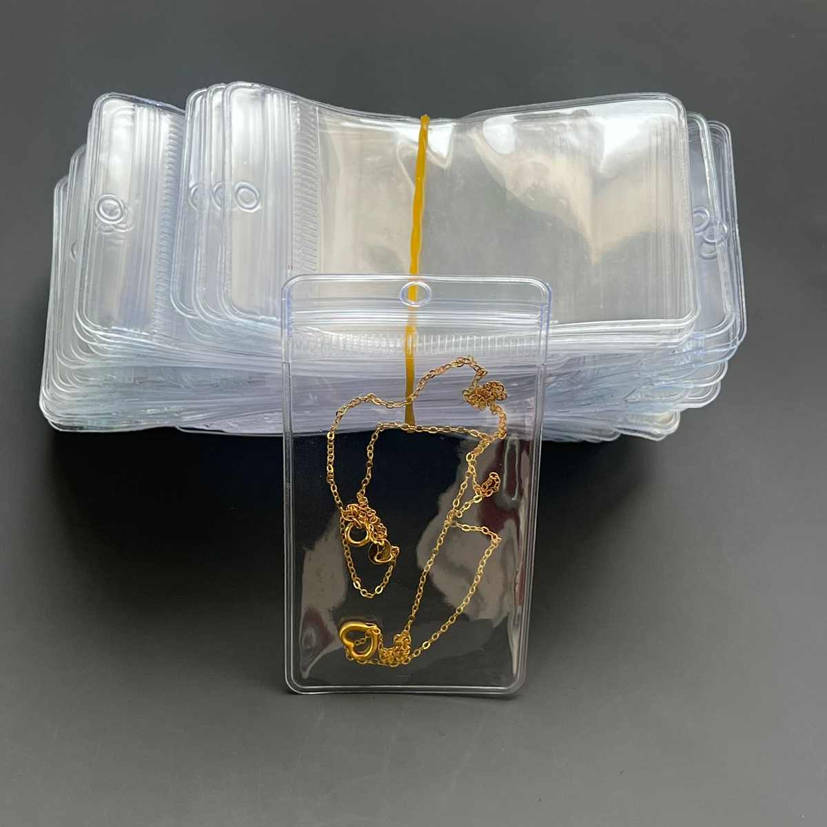 透明PVC夹骨链袋备扣袋密封袋饰品收纳包装袋吊牌领标挂孔小袋子