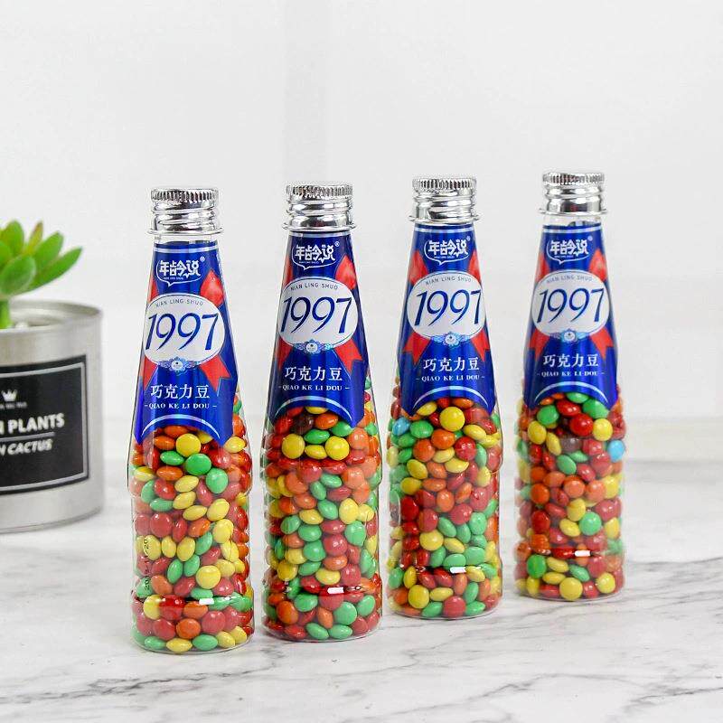 新款创意70克长瓶装1997七彩巧克力豆糖果小零食儿童休闲食品