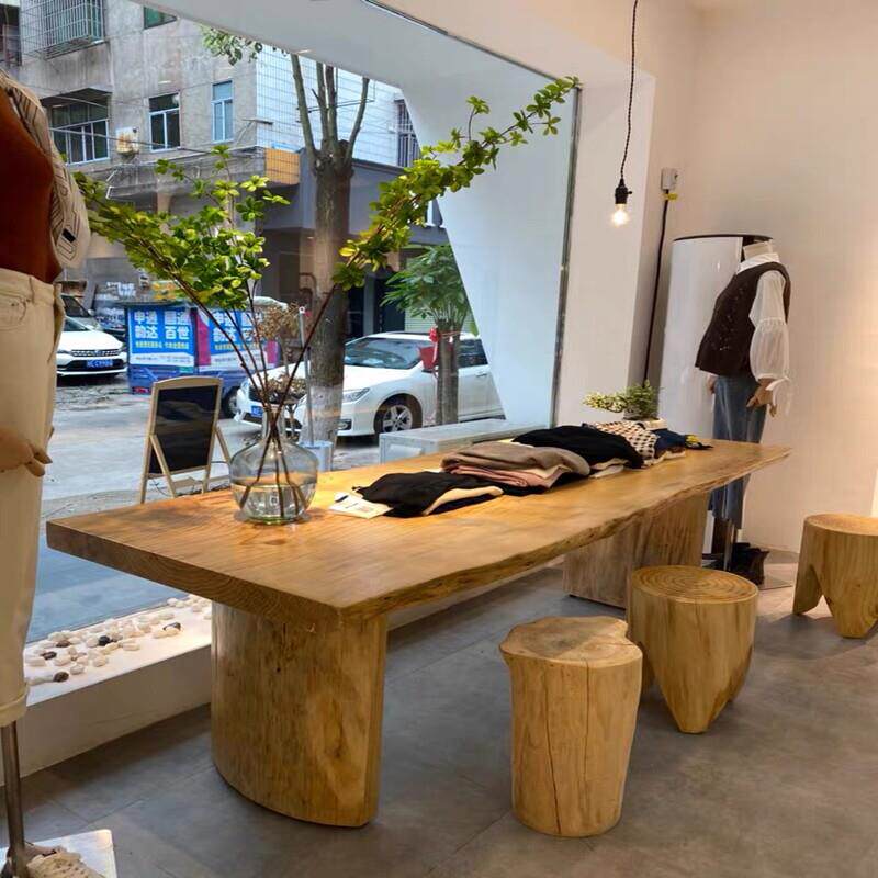 服装店中间摆放衣服饰品鞋包中岛流水台橱窗实木原木大板展示桌子