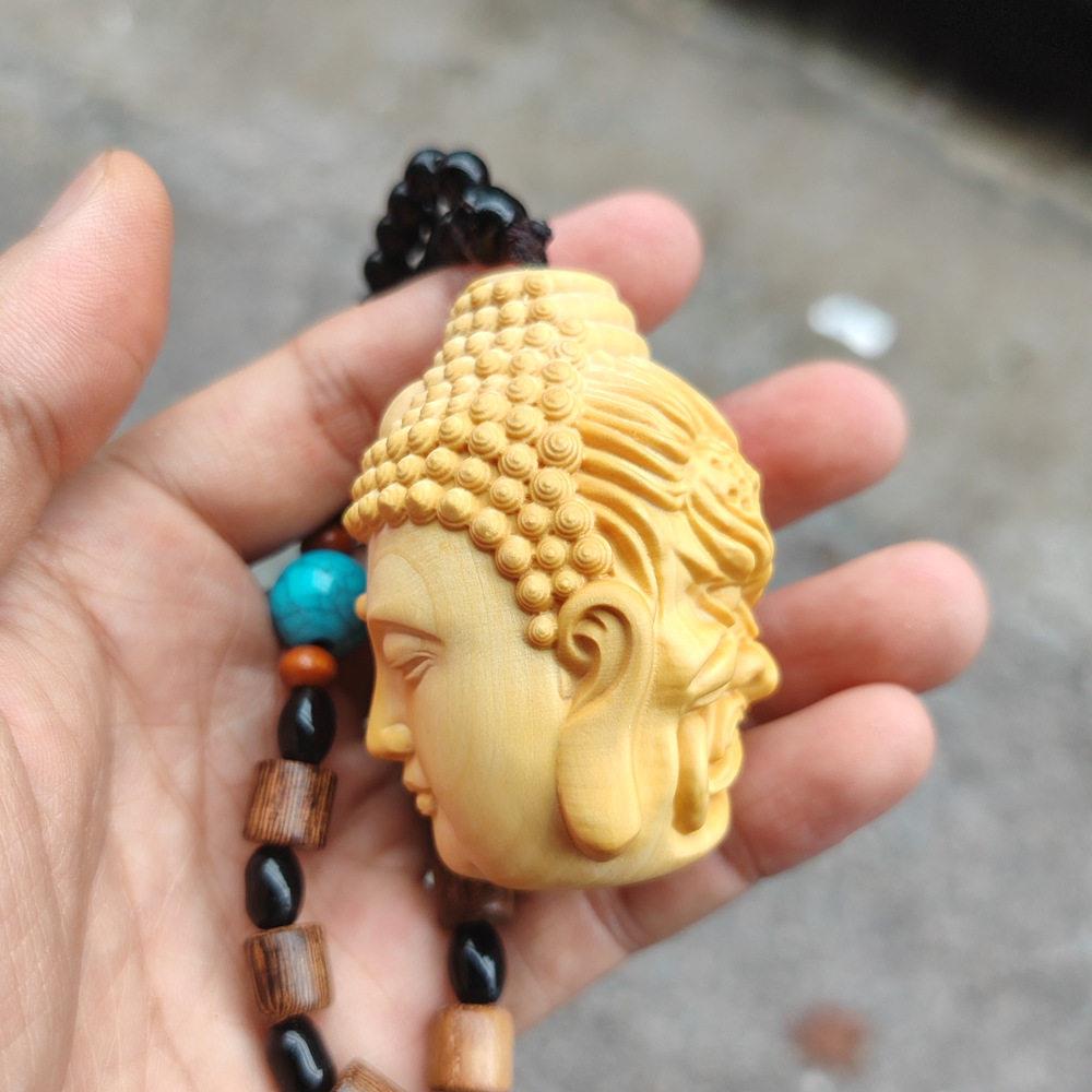崖柏木雕一念之间吊坠善恶佛魔手把件佛头工艺品文玩黄杨木小挂件