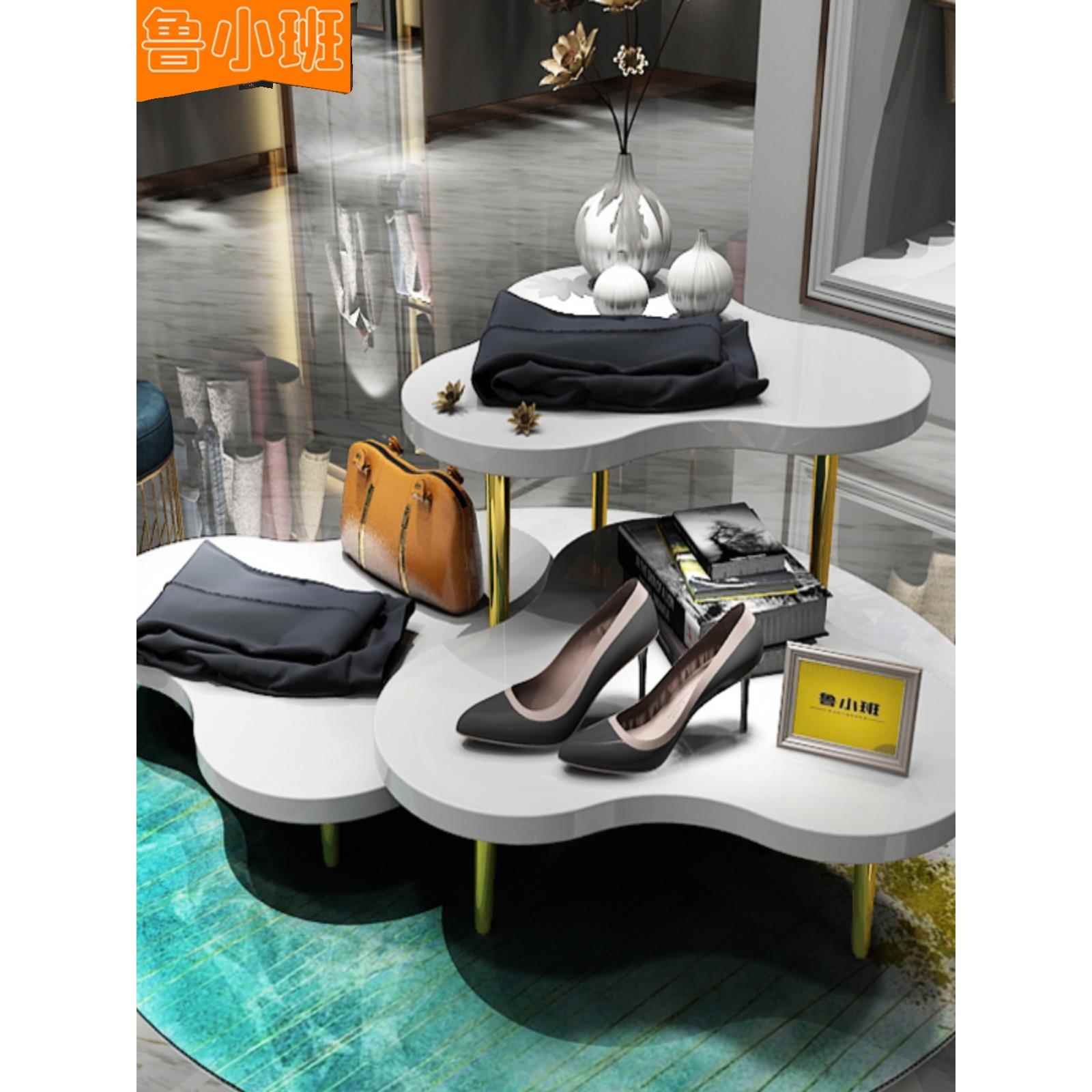 服装店岛展示台彩绘展示台流水展示台小展示台女装店中展示架图片